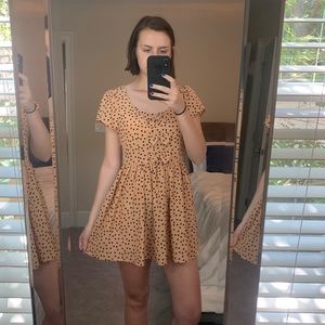 Pastel orange 1950s style polka dot a line dress